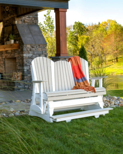 LuxCraft 5 foot balcony glider Birch and white in back year with fireplace.