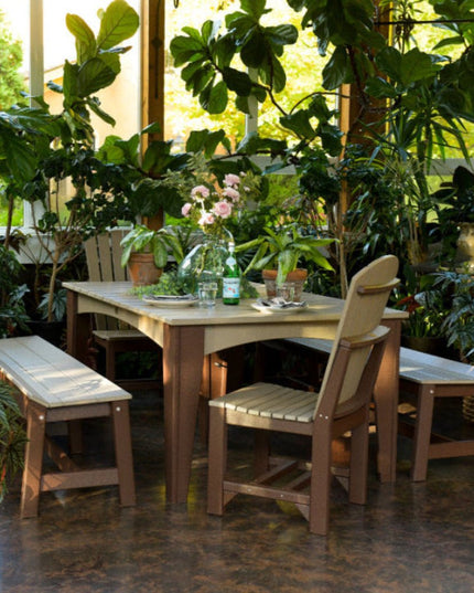 LuxCraft Adirondack side chair shown with LuxCraft island dining table (44" x 72" rectangular) and Café dining benches (72") in Weatherwood and chestnut brown