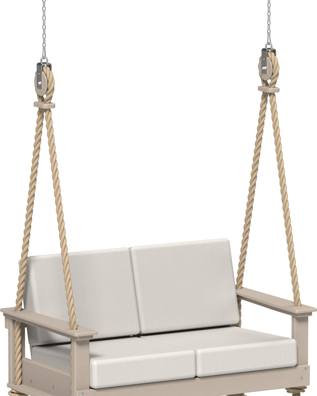 Beige swing with white cushions on a white background