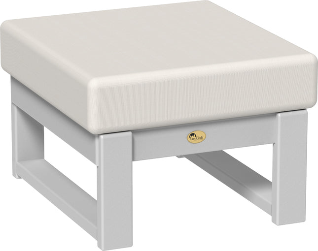 White ottoman with a canvas cushion on a white background