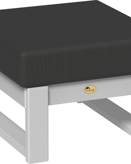 Black cushioned ottoman with a white frame on a white background