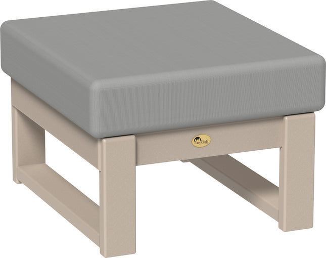 Gray cushioned ottoman with beige legs on a white background
