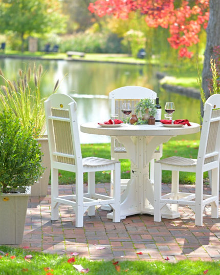 LuxCraft 4' Round Table in Birch and white with classic poly chairs