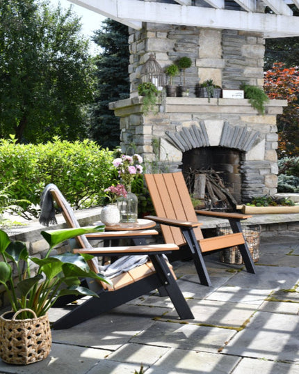 urban chat chair cedar black on patio with stone age fireplace